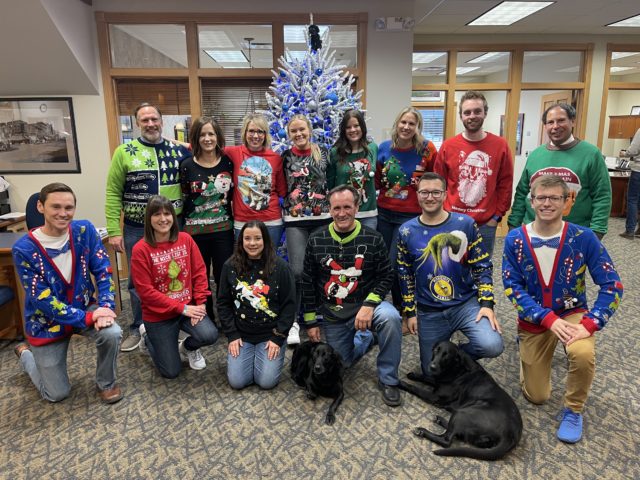 Group picture in ugly sweaters