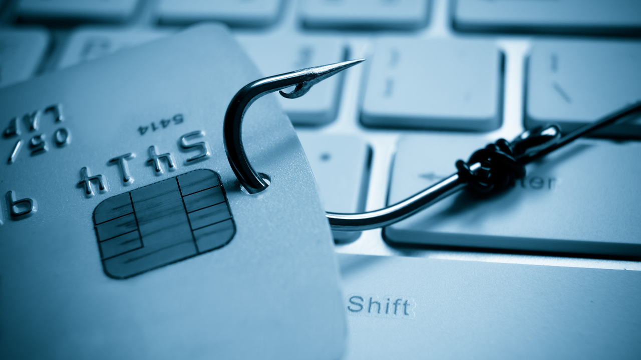 Fish hook through credit card to show phishing technique