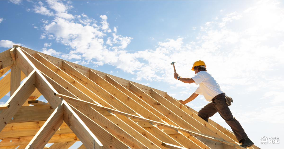 Construction worker building a house