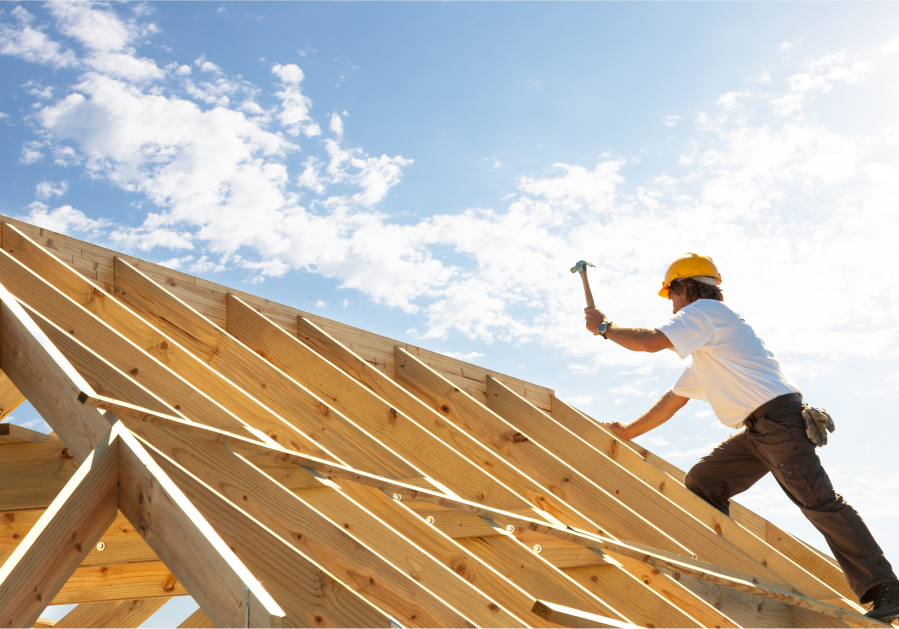 Construction worker building a house